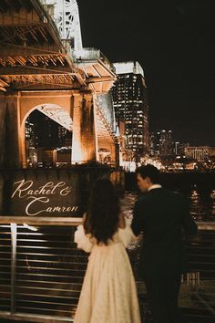 Bride and Groom Overlooking Downtown Nashville with their Names on the Pedestrian Bridge Running Body, Bride And Groom Photography, New Year's Eve Wedding, Nashville Wedding Venues, New Years Eve Weddings, Bridge Building, Future Wedding Plans, Future Mrs, Nashville Wedding