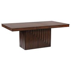 a large wooden table with an interesting design