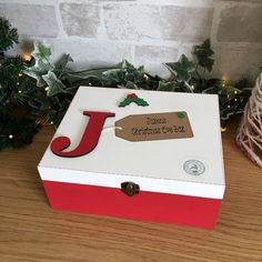 a christmas eve box sitting on top of a wooden table