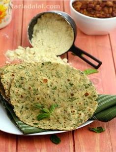 some food is on a white plate with green napkins