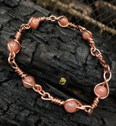 Completely handmade with copper and 5mm Sunstone beads. Each link hand twisted copper. Original design with matching pieces available. 1 of a kind. Copper Wire Jewelry Fire Mountain Gems And Beads, Antique Copper Jewelry, Sunstone Bracelet, Beaded Wrap Bracelets, Handmade Wire Jewelry, Beaded Wraps, Wire Crafts, Wire Art, Copper Jewelry