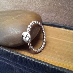 Great gift for any occasion! Comes in a huge choice of sizes and looks lovely worn on own or as a stacked ring look.  ❤️ Solid silver bubble ball style ring band 2mm thick with silver grain added and then personalised with up to two letters of your choice.  ❤️ Initials can be engraved sideways or straight on.  ❤️ The silver grain that the Initials is engraved on to will vary in size and shape, as it is molten silver melted down in its natural form.  Once the engraving has been completed on the r Sterling Silver Initial Ring For Everyday, Adjustable Silver Initial Ring Hand Stamped, Adjustable Silver Hand Stamped Initial Ring, Adjustable Sterling Silver Initial Ring For Gift, Adjustable Sterling Silver Initial Ring As A Gift, Everyday Sterling Silver Hallmarked Initial Ring, Hypoallergenic Silver Initial Ring As Gift, Adjustable Sterling Silver Signet Ring With Initials, Sterling Silver Initial Ring In Silver