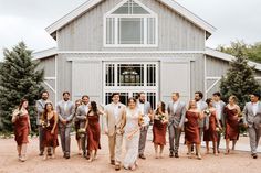 a group of people that are standing in front of a building