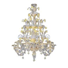 a chandelier with yellow flowers on it's sides and clear glass shades