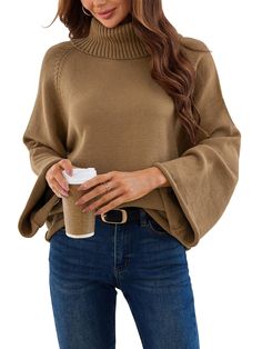 PRICES MAY VARY. 【Comfortable Fabric】This casual womens sweaters is made of soft, skin-friendly knitted fabric, which is warm and comfortable enough to keep you warm on cold days. 【Women's Turtleneck Sweater】This comfortable and casual sweater features a turtleneck design, and the flared long sleeve design exudes elegance, The shoulder line details add a fashionable and casual atmosphere. The hem and cuffs of the sweater are designed with rolled edges to make the sweater a fashionable and eye-ca Turtleneck Pullover, Long Sleeve Design, Oversized Turtleneck, Ladies Turtleneck Sweaters, Womens Sweaters, Sweater Oversize, Casual Sweater, Womens Turtleneck, Soft Skin