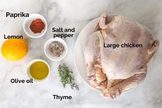 the ingredients for a whole chicken on a white plate