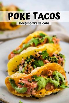 two tacos are sitting on a plate with the title text above it reads poke tacos