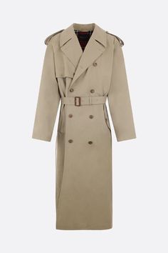 Balenciaga's double-breasted oversized trench coat crafted in beige cotton drill with removable belt. Featuring wide lapel, tabs at shoulders, long sleeves wtih tabs at cuffs, button closure, multiple pockets, back stormshield and box-pleat at hem at back. Lined interior.Gender: MenMaterial: T COTTON 100% ;BU BUBALUS BUBALIS O:IN 100% ;F WOOL 100% ;FM CUPRO 100% ;FP COTTON 100% ;Color: MILITARY BEIGEMade in: ITProduct ID: 776657TKP062801*Import tax/duty will be calculated at checkout (If applica Classic Khaki Belted Outerwear, Classic Khaki Outerwear With Belted Cuffs, Classic Oversized Outerwear With Belted Cuffs, Oversized Trench, Oversized Trench Coat, Box Pleats, Double Breasted, Balenciaga, Trench Coat