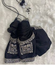 Check out this item in my Etsy shop https://www.etsy.com/listing/1483231303/black-rawsilk-blouse-with-silver-zardozi Layered Outfit Ideas, New Saree Blouse Designs, Zardozi Embroidery, Traditional Blouse Designs, Latest Model Blouse Designs, Fashionable Saree Blouse Designs, Blouse Design Images, Wedding Blouse Designs, Blouse Designs Indian