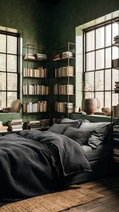 a bedroom with green walls and lots of books