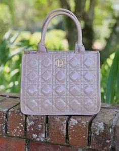 Get into fashion with this perfect year round bag. These bags are a perfect staple for your wardrobe. Hill Logo, Into Fashion, Quilt Material, Round Bag, Wallet Accessories, Mini Tote, Travel Jewelry, Sport Bag, Clutch Wallet