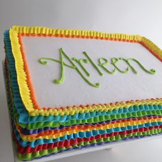 there is a cake that has been made to look like the name alien on it