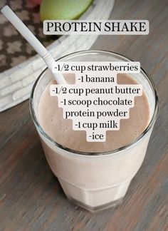 chocolate protein shake recipe in a glass with strawberries and banana on the side, labeled