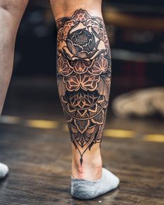 a person with a tattoo on their leg