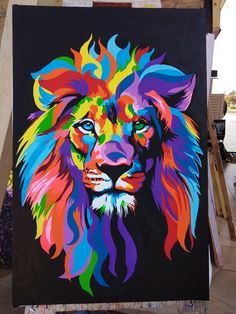 a painting of a colorful lion on a black background