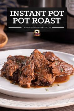 instant pot roast on a white plate with the words instant pot roast in front of it