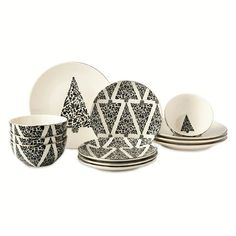 black and white dinnerware set with trees on it