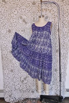 A lovely Indian gauze tent dress in soft light purple cotton fabric and a flowing silhouette. It features tiers and a front yoke, as well as piping along the neckline and arm openings! A classic piece of 1980's bohemian gauze, this breezy dress is perfect for everyday wear, and in excellent sturdy condition (rare for these Indian gauze beauties) It is marked size medium, but would best fit a size small, see measurements for details. All measurements taken flat across. Measurements Bust: 19" Hip: 29" Length: 44" Purple Cotton Fabric, Breezy Dress, Tent Dress, Soft Light, Dress Clothes For Women, Light Purple, Piping, Tent, Everyday Wear