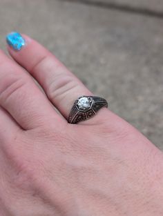 Silver Art Deco Style ring size 7. This is a repro of a vintage style Vintage Engraved Ring In Antique Silver For Wedding, Antique Finish Rings For Anniversary, Vintage Engraved Ring With Antique Finish For Anniversary, Heirloom Rings With Antique Finish For Anniversary, Heirloom Style Antique Finish Rings For Anniversary, Vintage Signet Ring With Intricate Design, Antique Silver Open Ring Vintage Style, Vintage Antique Silver Open Ring, Vintage Enamel Ring With Rose Cut Diamonds As Gift