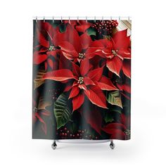 a christmas themed shower curtain with poinsettia and holly leaves on black background