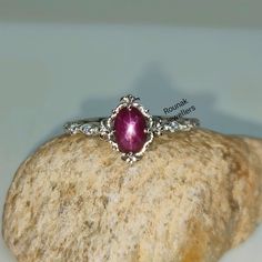 Band - rounak jewellers material - 925 sterling silver main stone - 100 %natural star ruby star ruby stone weight - 1.35 carat star ruby stone size - 5 x 7 mm secondary stone - cubic zirconia zirconia stone weight - 0.10 carat zirconia stone size - 1.20 mm gross weight - 2.320 gm stone shape - oval, round gem colour - red, white ring size - all size available please give your openion or feedback about the product. we accept bulk order also. Silver Star-shaped Gemstone Ring, Sterling Silver Star-shaped Jewelry With Prong Setting, Sterling Silver Star Jewelry With Prong Setting, Silver Ruby Ring With Center Stone In Sterling Silver, Silver Ruby Ring With Diamond Bezel Setting, Silver Ruby Ring With Center Stone, Silver Star-shaped Ring With Gemstone, Sterling Silver Star-shaped Diamond Ring, Star Shaped Sapphire Ring For Anniversary In Sterling Silver