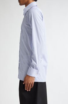 An oversized collar and dropped hem bring subtly exaggerated proportions to a shirt tailored from striped cotton and smartly finished with crisp French cuffs. 33" length; 40" chest (size 40) Front button closure Spread collar Long sleeves with French cuffs 100% cotton Dry clean Made in Italy Designer Clothing Elegant Striped Button-up Dress Shirt, Elegant Formal Shirt With Striped Collar, Elegant Pinstripe Dress Shirt For Business Casual, Striped Button-up Dress Shirt For Formal Occasions, Formal Striped Button-up Dress Shirt, Elegant Dress Shirt With Striped Collar For Work, Elegant Dress Shirt With Striped Collar For Business Casual, Elegant Dress Shirt With Striped Collar, Elegant Business Casual Dress Shirt With Striped Collar