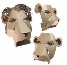 three paper animal heads are shown together