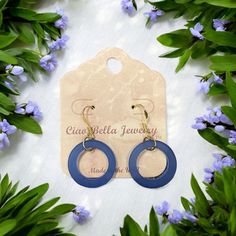 Description: Immerse yourself in the ocean's beauty with our enchanting Royal Blue Sea Glass Hoop Earrings. Handcrafted with genuine sea glass, these unique earrings capture the essence of the coast. The vibrant blue hue complements a variety of styles, making them perfect for both casual and dressy occasions. Experience the allure of the sea with every wear. Features: Genuine sea glass Royal blue color Handmade craftsmanship Gold earring hooks Versatile style Perfect for beach lovers and jewelr Blue Hypoallergenic Hoop Jewelry, Hypoallergenic Blue Hoop Jewelry, Blue Hoop Earrings With Ear Wire For Beach, Blue Hoop Earrings With Ear Wire, Blue Hypoallergenic Small Hoop Jewelry, Blue Hypoallergenic Small Hoop Earrings, Blue Hypoallergenic Hoop Earrings, Hypoallergenic Blue Small Hoop Jewelry, Blue Hoop Jewelry For The Beach