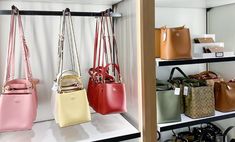 several purses and handbags on shelves in a store