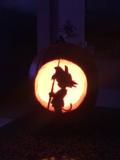 a pumpkin carved to look like sonic the hedgehog