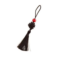 a black tassel with red beads on it