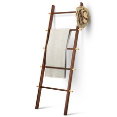 a towel rack with a hat on it