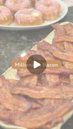 two plates filled with donuts and bacon on top of a counter next to another plate full of doughnuts