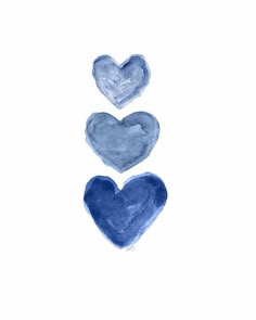 three blue hearts on a white background