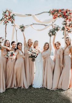 a group of women standing next to each other