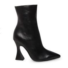 Make A Statement In Any Outfit With The Variant Bootie From Steve Madden. This Ankle Boot Features A Unique Wavy Block Heel That Complements The Pointed Toe For Added Drama. Features Synthetic Upper Inside Zipper Closure Pointed Toe Textile & Synthetic Lining Padded Footbed Approx. 6" Shaft Height Approx. 10" Leg Opening 4" Triangle Block Heel Synthetic Sole Imported New Without Box. Store Markings At The Bottom Medium Width Synthetic Heeled Boots With Pointed Toe, Trendy Formal Boots With Round Toe, Synthetic Closed Toe Boots With 4-inch Heel, Synthetic High Heel Boots With Sculpted Heel, Trendy Formal Synthetic Boots, Heeled Boots With Padded Heel And Pointed Toe, Chic Pointed Toe Synthetic Boots, Chic High Heel Synthetic Boots, Elegant Synthetic Boots With 4-inch Heel