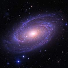 an image of a spiral galaxy in the sky