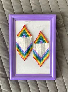 "These are native rainbow beaded earrings made with love for you. It also makes an excellent gift for Easter, birthdays, anniversaries, mother's day, valentine's day and more. ♡ Bead Length - 3,7\" (9,5 cm) ♡ Total Length - 4,1\" (10.5 cm) ♡ Width - 1,6\" (4 cm) ♡ Quality Czech beads If you like these fringe tassel drop dange earrings, but would like them in a different color please email me and I do special orders. I accept payments through Paypal. The colors can slightly differ from the photo Handmade Rainbow Beaded Dangle Earrings, Rainbow Dangle Beaded Earrings Handmade, Beaded Rainbow Drop Earrings, Rainbow Handmade Beaded Dangle Earrings, Rainbow Dangle Earrings With Tiny Beads, Rainbow Dangle Jewelry With Tiny Beads, Rainbow Round Bead Earrings For Gifts, Adjustable Rainbow Earrings With Tiny Beads, Rainbow Beaded Drop Earrings For Gift