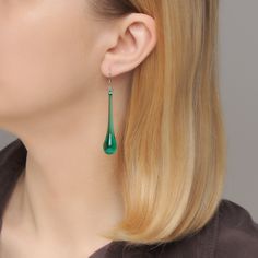 "These teal or emerald green teardrop earrings are made of glass in lampwork technique. The stainless steel hooks are hypoallergenic. They will not tarnish, fade, or discolor with time. These unique and beautiful earrings are like water drops frozen in glass! They are simple and elegant, very lightweight and comfortable to wear, perfect for everyday wear and for special occasions. You will definitely receive lots of compliments on your new earrings, everybody loves them, and you'll love them too Black Statement Earrings, Teal Earrings, Earrings Emerald, Glass Drop Earrings, Tear Drop Earrings, New Earrings, Long Drop Earrings, Earrings Elegant, Lampwork Glass Beads