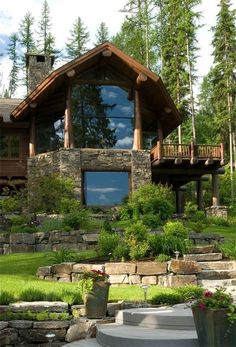 a large house with stone steps leading up to it