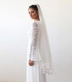 THIS ITEM WILL SHIP WITHIN 1-5 BUSINESS DAYS   Elegant mid long tulle veil with lace trim. 50cm long   Beautiful fingertip-length tulle veil is detailed that complements your bridal look perfectly!  The veils arrive in colors: Ivory, Blush, Light blue and Champagne.   The veils also can be made in 70cm long or 1.2m Veil With Lace Trim, Wedding Veil Short, Budget Wedding Dress, Comfortable Wedding Dress, Boho Wedding Veil, Wedding Dresses Under 500, Veil Short, Veil With Lace, Soft Tulle Veil