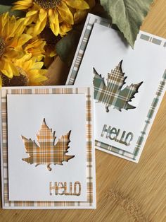 two cards with the words hello fall written on them and some sunflowers in the background