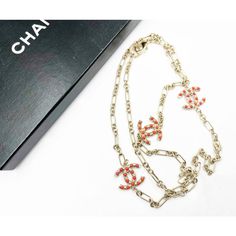 Chanel Gold CC Red Bead Chain Necklace  *Marked 08 *Made in Italy *Comes with original box  -Approximately 40″ long total -Pendants are approximately 1″ x 1″. -Wrap around double or wear as a long necklace. -In an excellent condition.  AB8008-00179  Please see the measurements section for best approximate dimensions. Red Long Necklace With Adjustable Chain, Designer Chain Necklace As Gift, Elegant Red Beaded Chain Necklace, Elegant Red Long Necklace For Gift, Designer Red Jewelry Gift, Designer Red Jewelry As Gift, Luxury Red Necklaces, Designer Red Jewelry For Gift, Luxury Beaded Chain Necklace As Gift