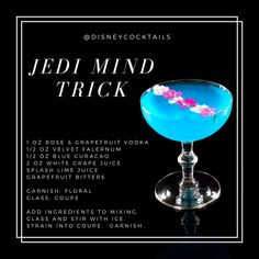 a blue drink in a glass with the words jedi mind trick on it