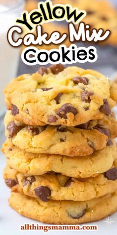 yellow cake mix cookies stacked on top of each other with chocolate chips and milk in the background