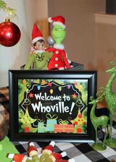 an image of a welcome sign for the holiday season with elf and grinen decorations