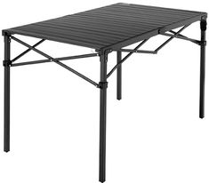 an outdoor table with metal legs and a black cover on the top, against a white background