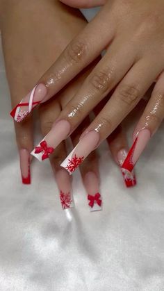 Wine Acrylic Nail Designs, Red Long Christmas Nails, Christmas Tapered Square Nails, Bougie Acrylic Nails, White And Red Nails With Designs, Christmas Nails And Toes Matching, Latina Christmas Nails, Christmas Ideas Nails, Red Nails With Ribbon