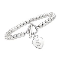 Ross-Simons - Plain - Italian Sterling Silver Heart Charm Bead Bracelet. Take the trend in your own hands! Our stack-ready bracelet features 5mm sterling silver beads and a polished heart charm. Made in Italy. Toggle clasp, sterling silver heart charm bead bracelet. Sterling Silver Beaded Bracelets With Heart Beads, Sterling Silver Bracelet With Heart Beads, Sterling Silver Heart Beaded Bracelets, Elegant Sterling Silver Beaded Bracelets With Heart Beads, Elegant Sterling Silver Beaded Bracelet With Heart Charm, Elegant Sterling Silver Heart Bracelet With Round Beads, Sterling Silver Heart Bracelet With Round Beads, Classic Heart-shaped Bracelets With Sterling Silver Clasp, Heart-shaped Sterling Silver Charm Bracelet