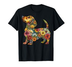 a dachshund dog with flowers on it's chest t - shirt